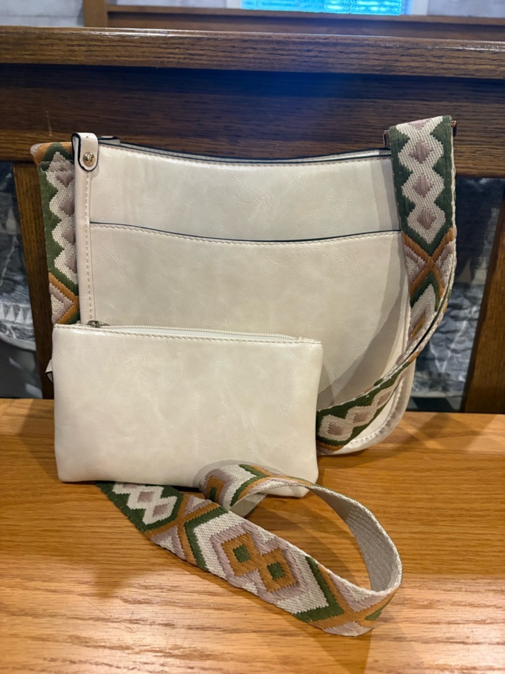 Like New! Women’s Cream Crossbody Bag with Patterned Strap